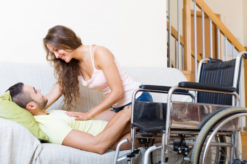 Disabled man with woman